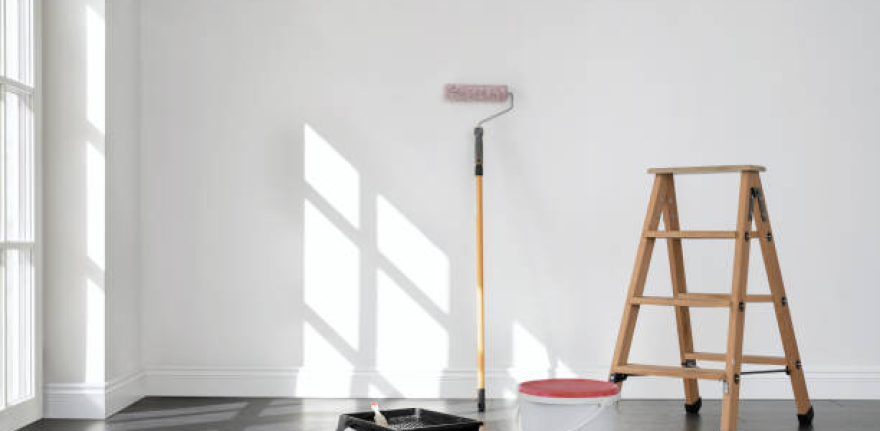 Painting the room, empty apartment ready for renovation, with copy space